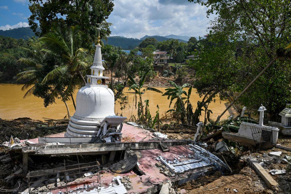 A stupa lies in a damaged state following the landslides in the aftermath of Cyclone Ditwah in Gampola town, in Kandy district on Dec. 4, 2025. (AFP)