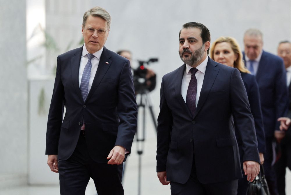 Slovenia’s Ambassador to the United Nations, Samuel Zbogar, left, with Syria’s Foreign Minister Asaad Al-Shaibani, at the People’s Palace, in Damascus, Syria, Dec. 4, 2025. (Reuters)