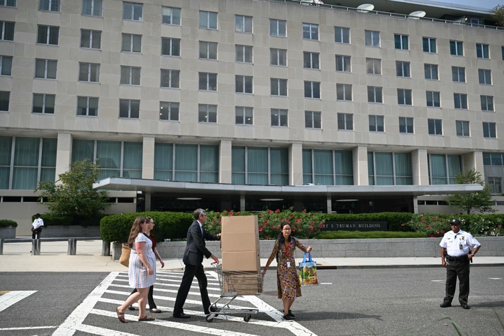 Hundreds of those workers were terminated in September, before the shutdown. (AFP/File)