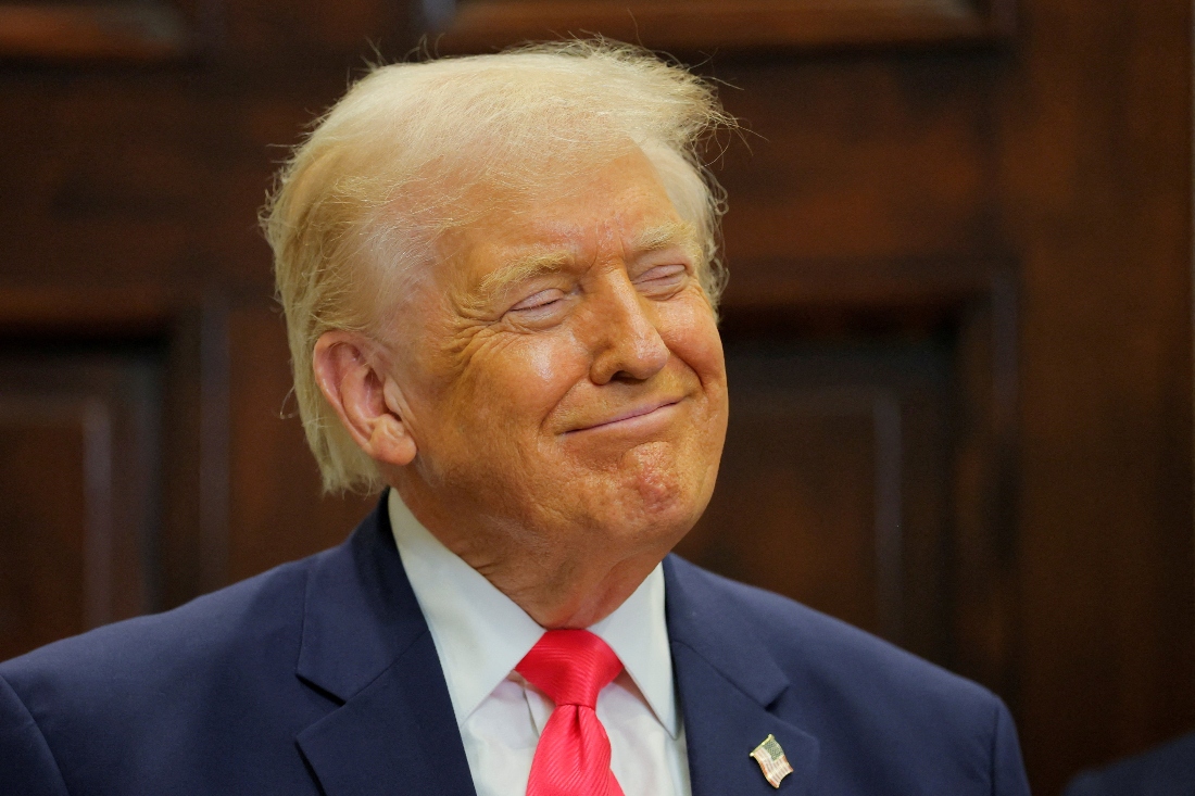 US President Donald Trump smiles during an announcement at the White House, in Washington, US. (Reuters)