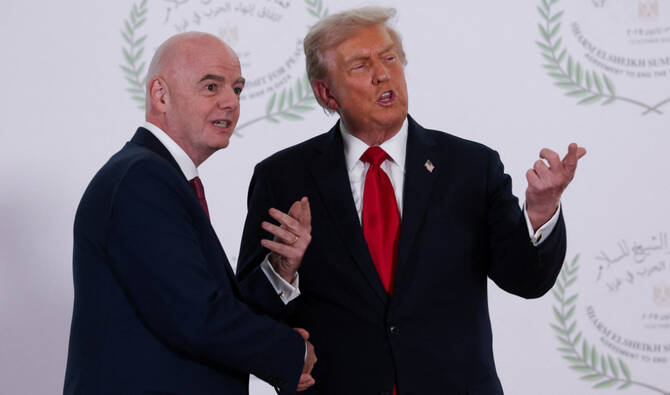 US President Donald Trump turned the spotlight onto FIFA president Gianni Infantino ahead of Friday’s 2026 World Cup draw in Washington, praising the football boss’ organization of the world’s biggest sporting event. (AP/File)