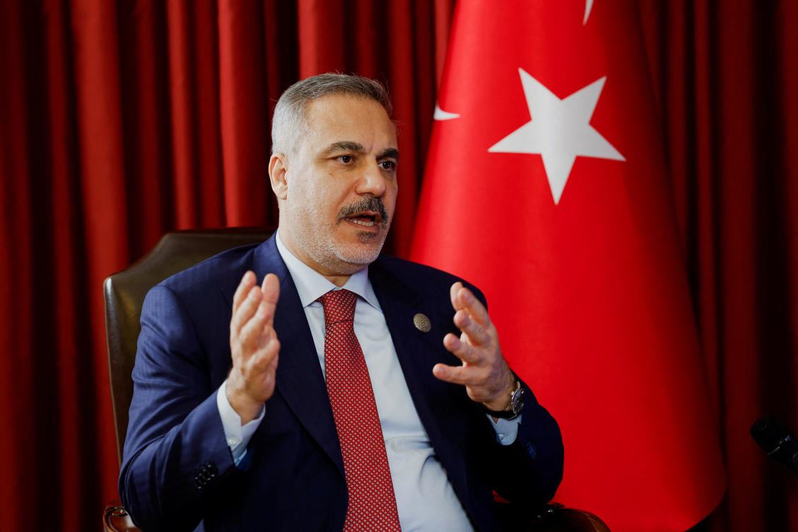Turkish Foreign Minister Hakan Fidan speaks during an interview with Reuters at the 23rd edition of the annual Doha Forum, in Doha, Qatar, December 6, 2025. REUTERS/Ibraheem Abu Mustafa