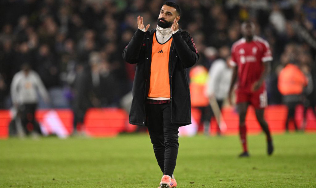 Liverpool's Egyptian striker #11 Mohamed Salah applauds fans on the pitch after the English Premier League football match between Leeds United and Liverpool at Elland Road in Leeds, northern England on December 6, 2025. (AFP)