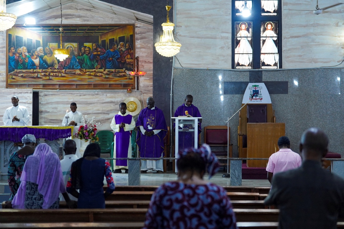 Worshippers attend an evening Mass at St. Michael Cathedral in Minna, Niger State, Nigeria. (Reuters)
