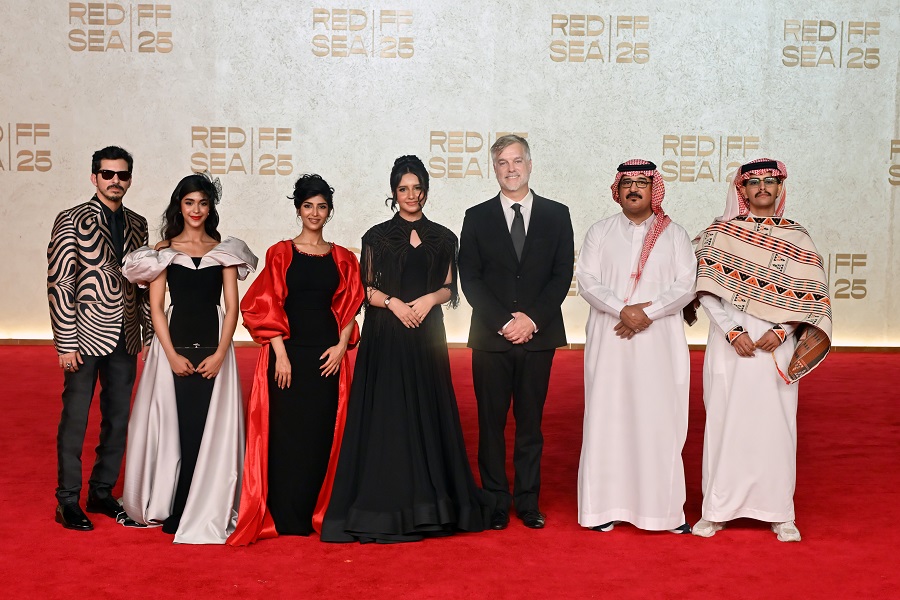 L-R: Aziz Gharbawi, Somaya Al-Shareef, Intisar Al-Shareef, Othoub Sharar, Brad Niemann, Shafi Alharthi and Abduallah Al-Qahtani at the premiere. (Getty Images)