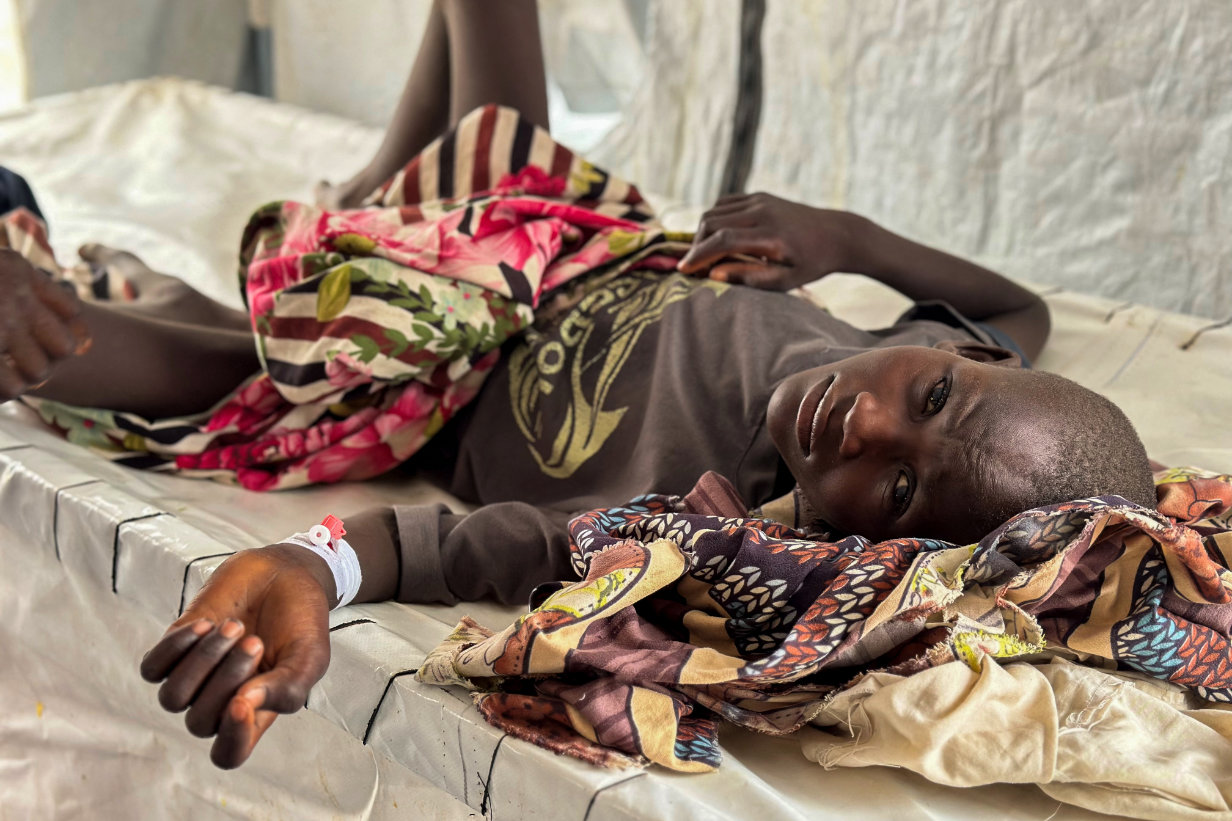A child infected with cholera receives treatment in the cholera isolation centre at the refugee camps of western Sudan, in Tawila city in Darfur, on August 12, 2025. (AFP)