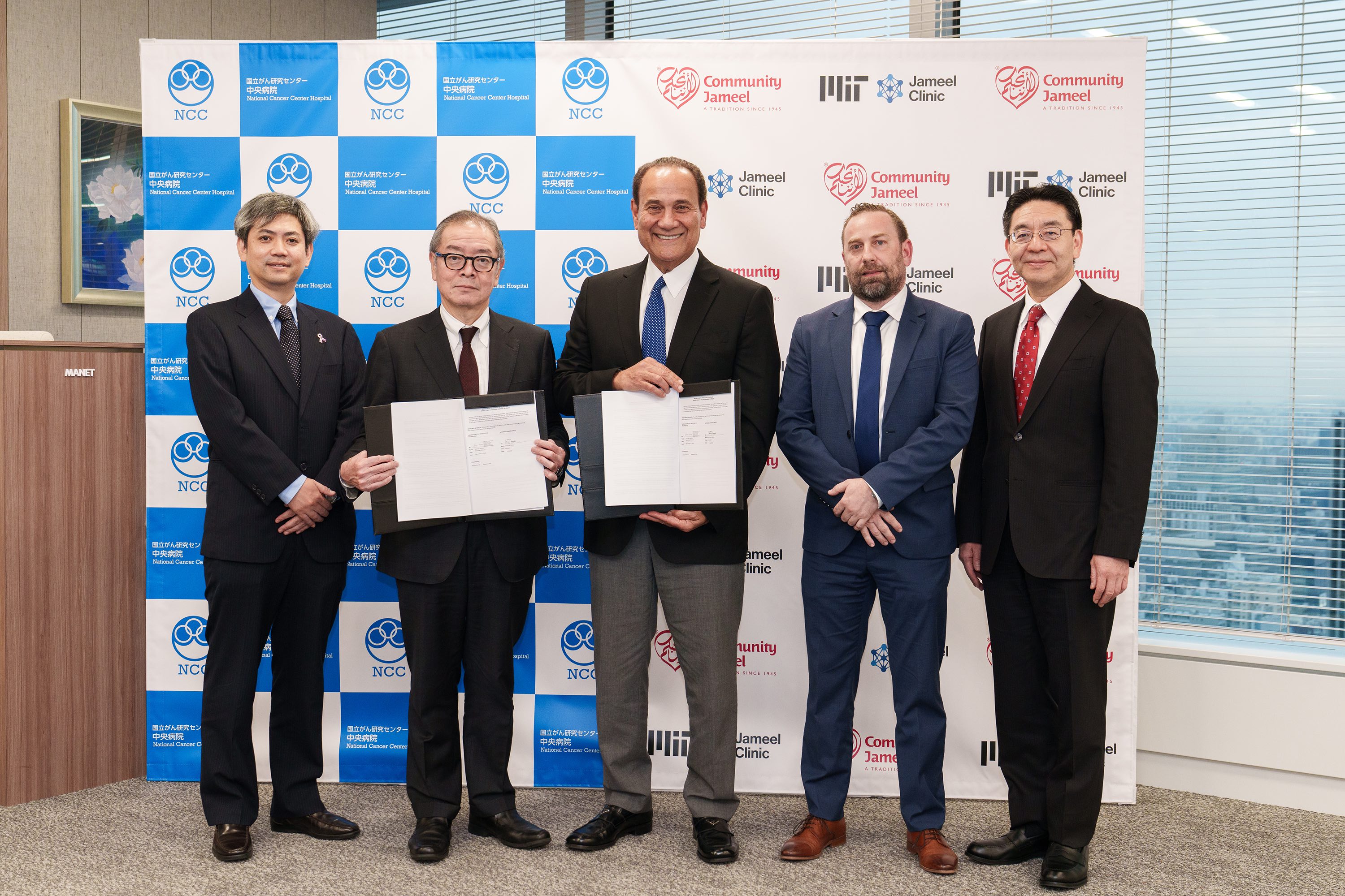 From left, Dr. Kan Yonemori; Dr. Yasuyuki Seto; Mohammed Jameel KBE; Nacer Eddine Mami, MD, regional lead, MENASA, MIT Jameel Clinic; and Koji Nagata, CEO, Jameel Corporation.