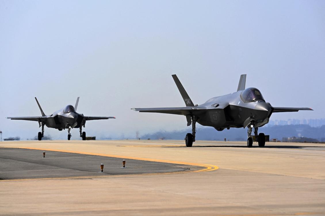 Above, South Korean Air Force F-35A fighter jets prepare to take off at an undisclosed air base in South Korea during an air drill on March 13, 2024. (South Korean Defense Ministry/AFP file photo)