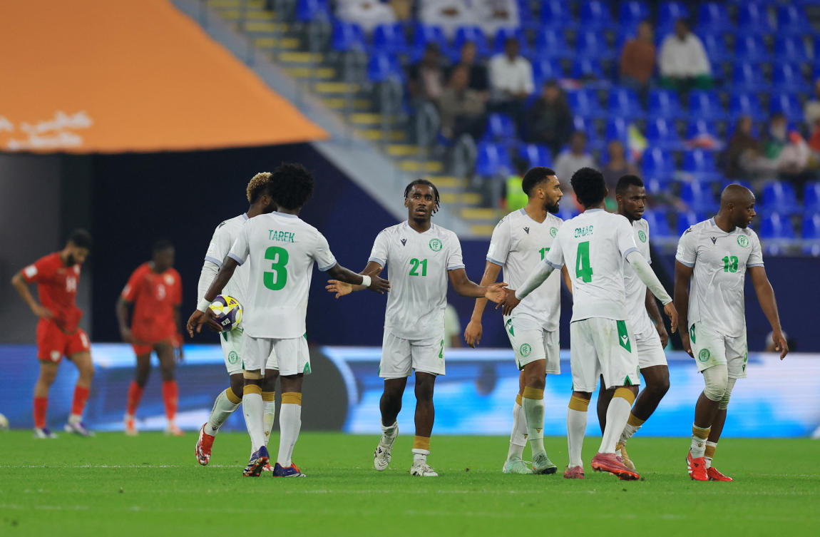 Comoros’ Nassuir Hamidou celebrates scoring their first goal with teammates during their FIFA Arab Cup — Qatar 2025 — Group B — match against Oman- Stadium 974, Doha — Dec. 8, 2025. (Reuters)