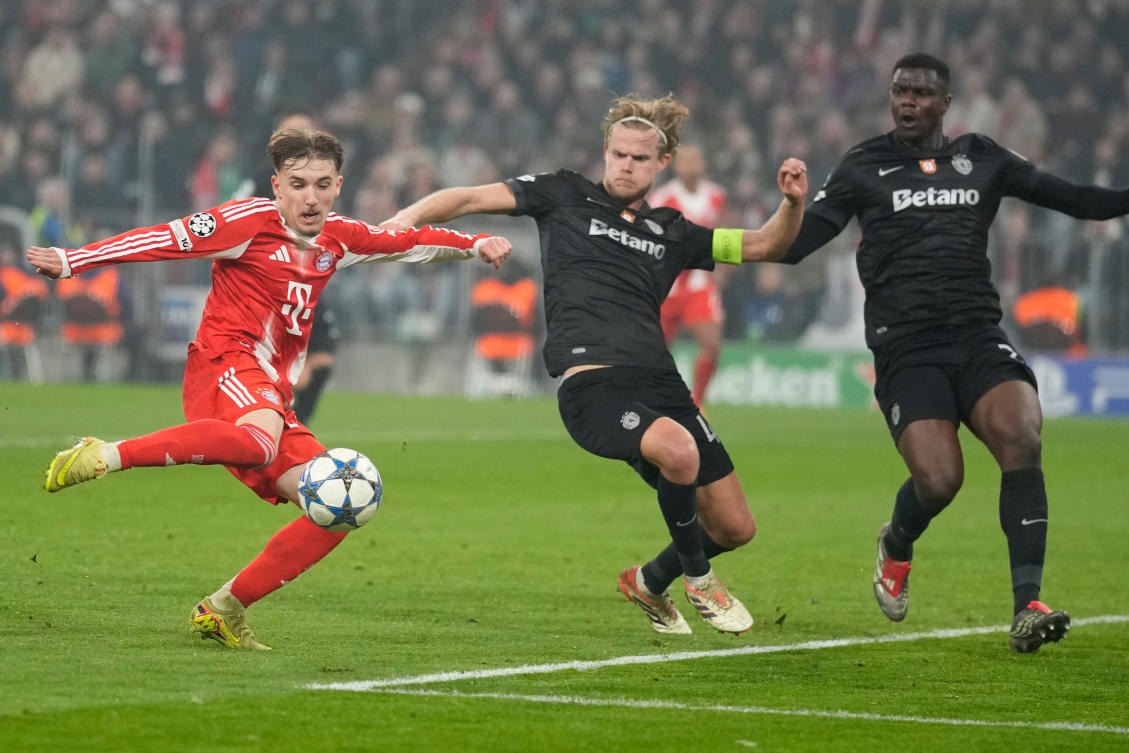 Bayern’s Lennart Karl scores his side’s second goal during their Champions League opening phase match against Sporting CP in Munich, Dec. 9, 2025. (AP)