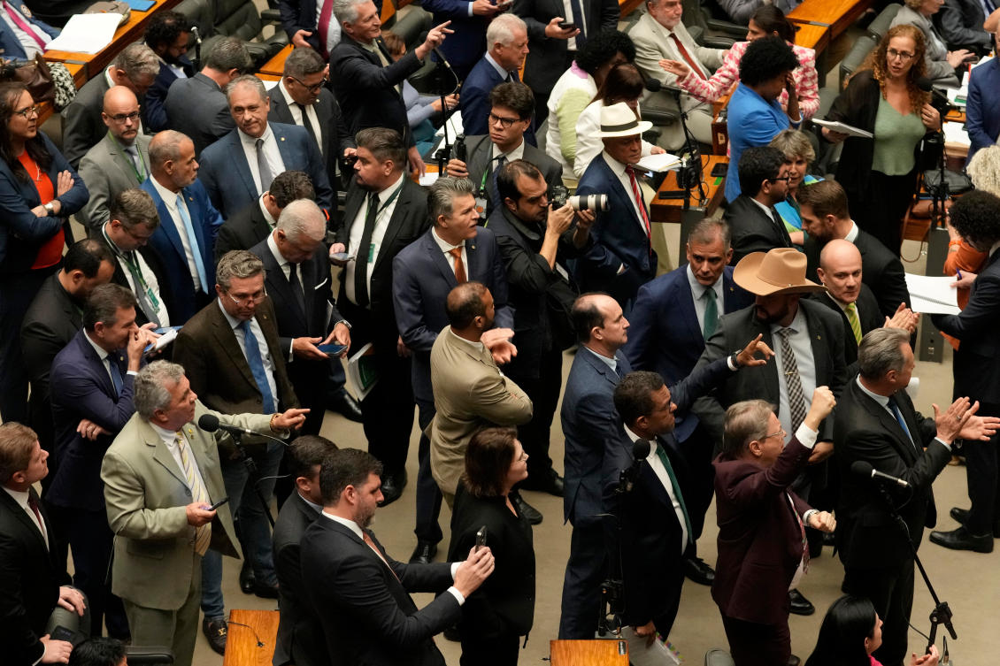 Congresspeople from parties supporting former President Jair Bolsonaro attend a session to consider a bill to alter sentencing guidelines for certain crimes on Dec. 9, 2025. (AP)