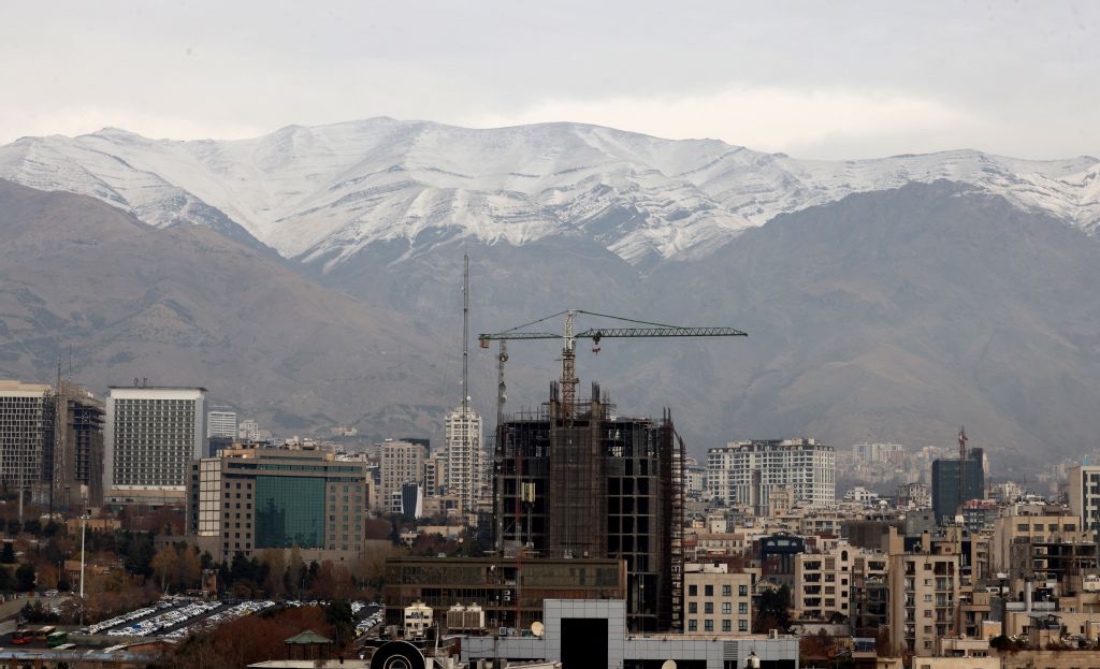 A general view shows the Iranian capital Tehran with the snow-covered Alborz mountain range in the background. (AFP)