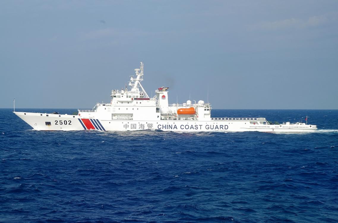 Above, a Chinese Coast Guard boat sails into waters near the disputed Senkaku islands on Nov. 6, 2016. (Japan Coast Guard/AFP file photo)