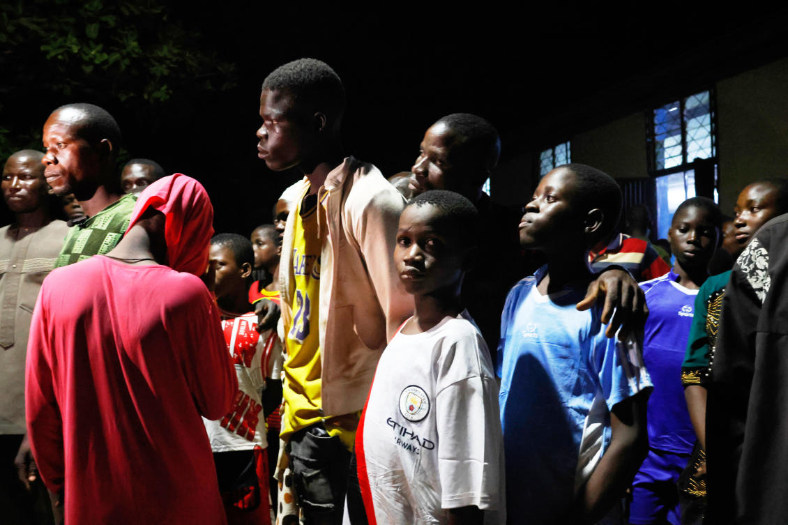 Freed students of St. Mary's Catholic School are reunited with their parents in Papiri community, Nigeria, Tuesday, Dec. 9, 2025. (AP)