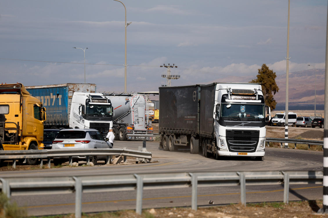 Trucks carrying goods from Jordan, near the Allenby crossing between the occupied West Bank and Jordan. (Reuters)