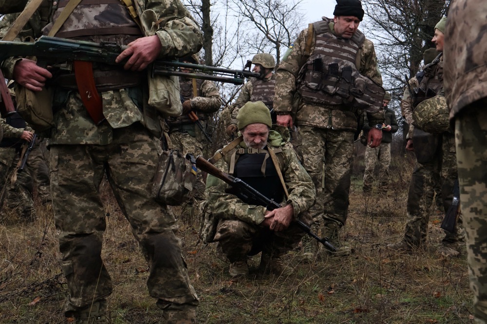 Forces rest during their first military drill as recruits near a frontline, amid Russia’s attack on Ukraine, Zaporizhzhia region, Ukraine, December 12, 2025.
