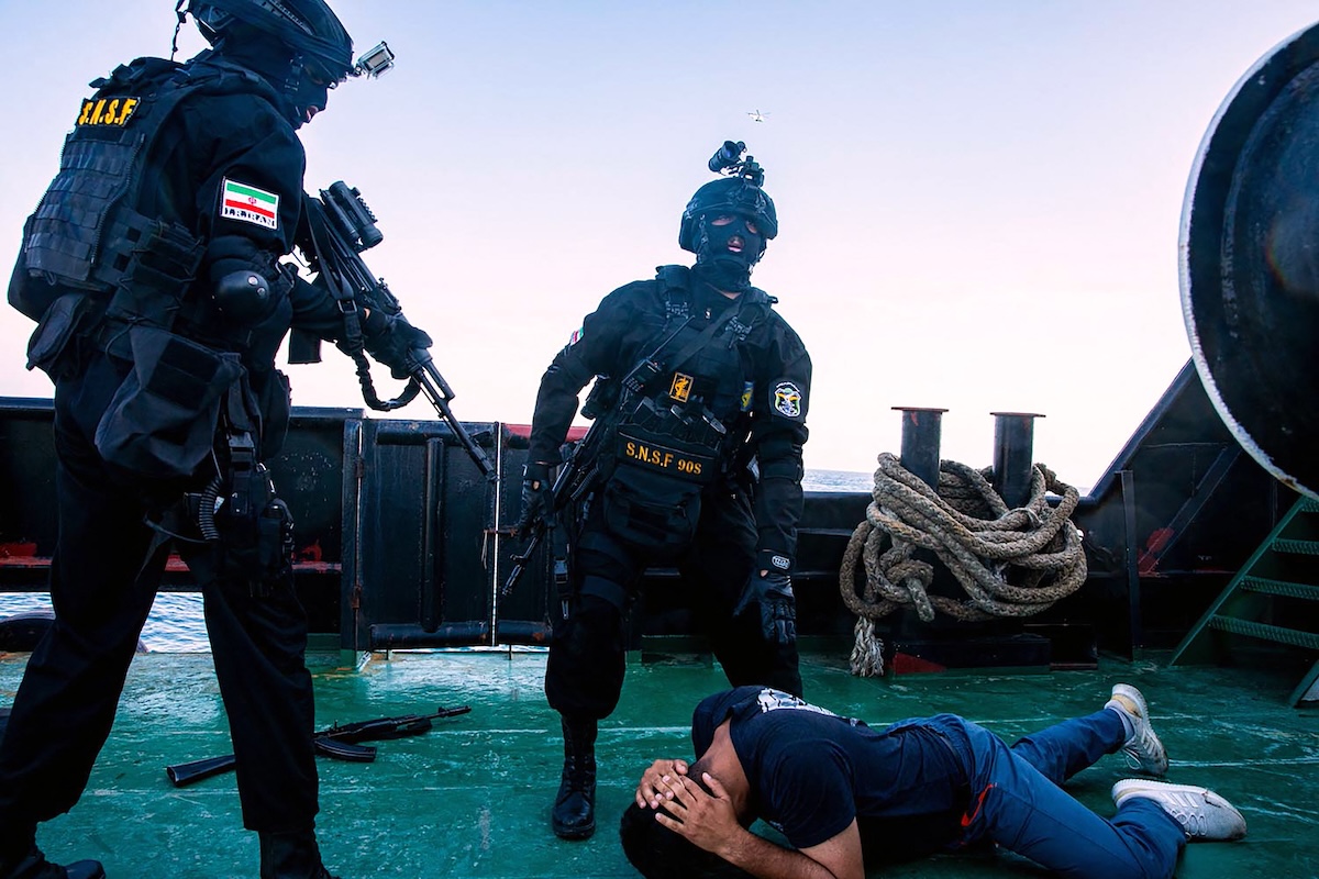 This handout photo made available by the Iranian Army Office on March 11, 2025 shows Iranian navy personnel in action during a joint Iranian-Russian-Chinese military drill in the Gulf of Oman. (FILE/AFP)
