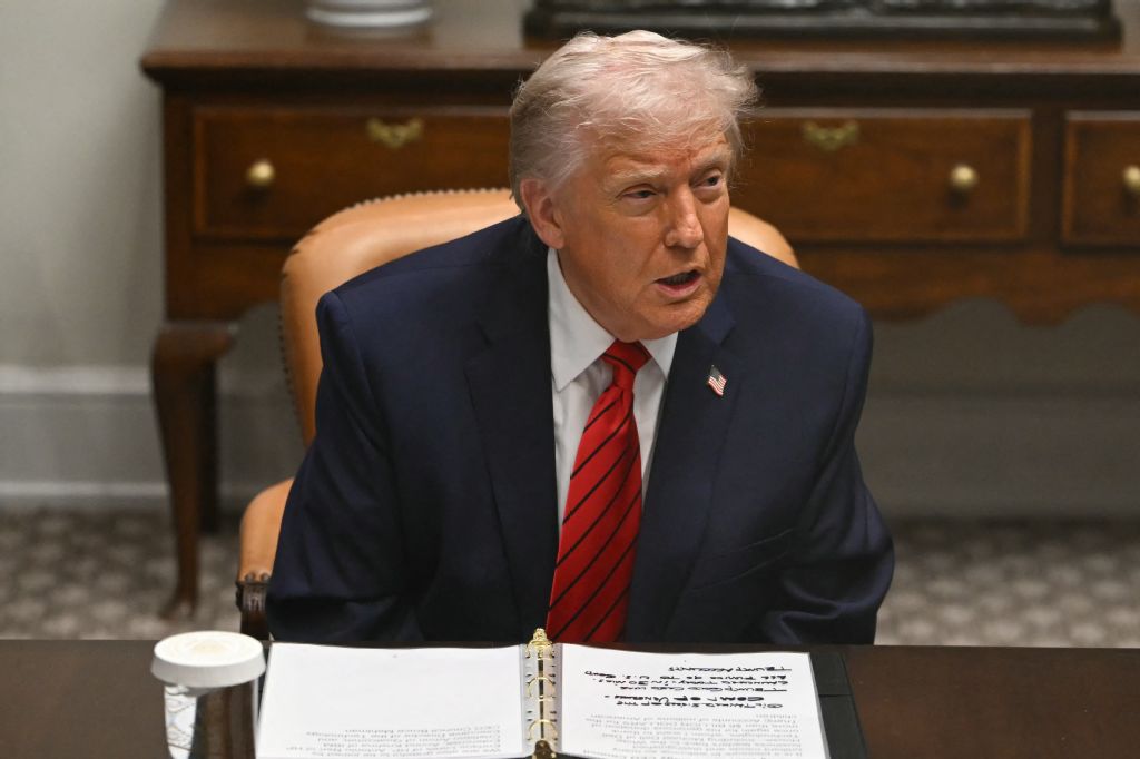 US President Donald Trump speaks during a roundtable discussion in the Roosevelt Room of the White House in Washington, DC, (AFP)