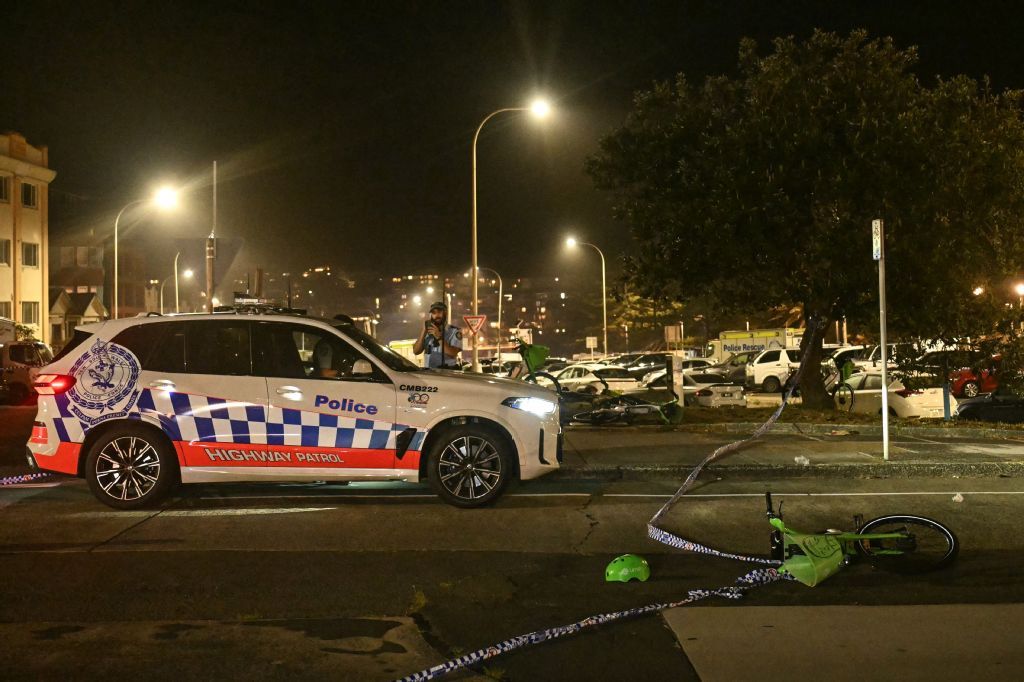 Policeman work at the scene after a shooting incident at Bondi Beach in Sydney on December 14, 2025. (AFP)