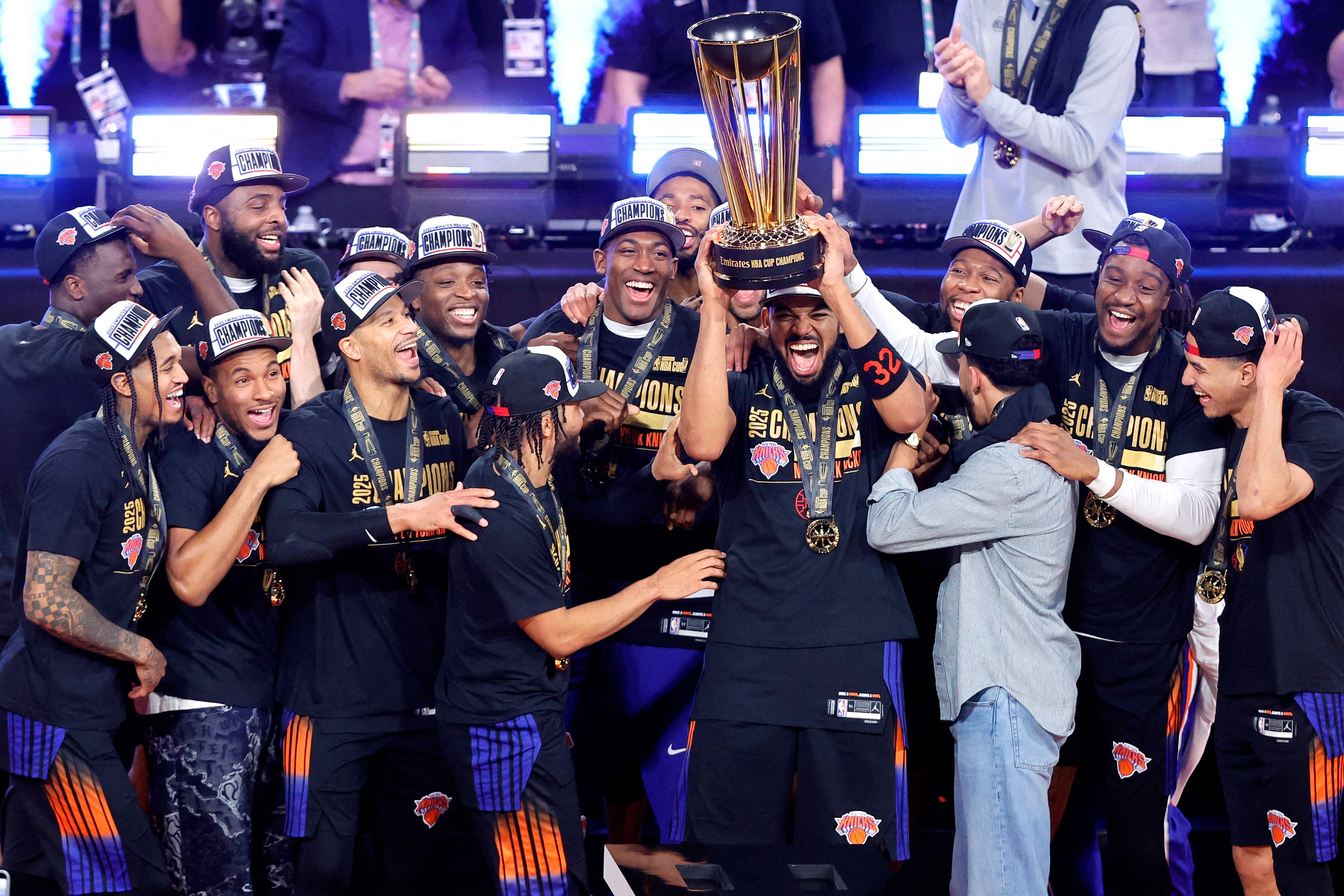The New York Knicks celebrate with the trophy after the Knicks defeated San Antonio Spurs 124-113 in the Emirates NBA Cup championship game at T-Mobile Arena on Tuesday in Las Vegas, Nevada. (Getty Images via AFP)