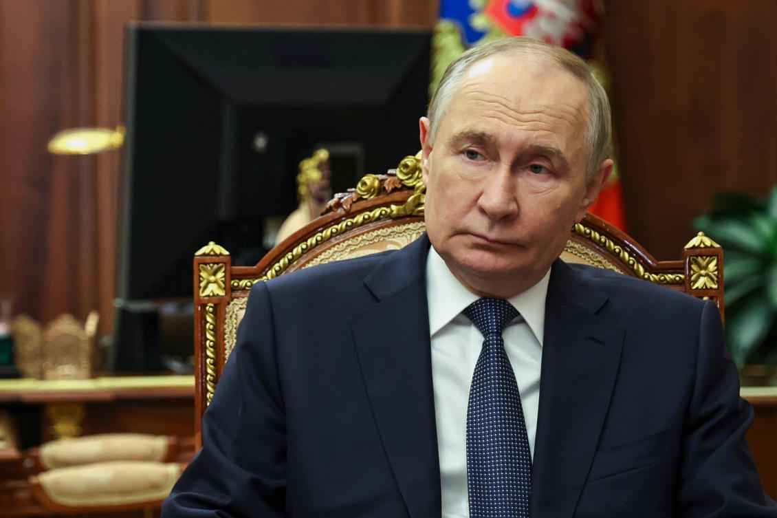 Russian President Vladimir Putin, right, listens to Secretary of United Russia party’s General Council Vladimir Yakushev during their meeting at the Kremlin, in Moscow. (AP)
