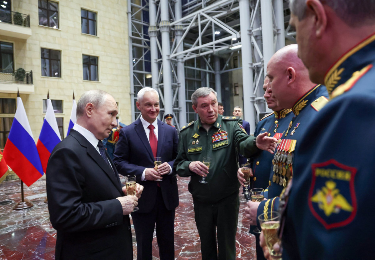 Russia's President Vladimir Putin, Defense Minister Andrei Belousov and Chief of the General Staff of the Russian Armed Forces Valery Gerasimov take part in a ceremony to present Gold Star medals to service members in Moscow on December 17, 2025. (Sputnik/Alexander Kazakov/Pool via REUTERS)