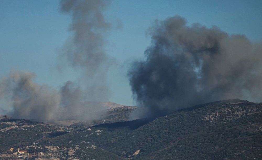 Smoke rises from the site of a series of Israeli airstrikes that targeted the outskirts of the southern Lebanese village of Al-Katrani on December 18, 2025. (AFP)