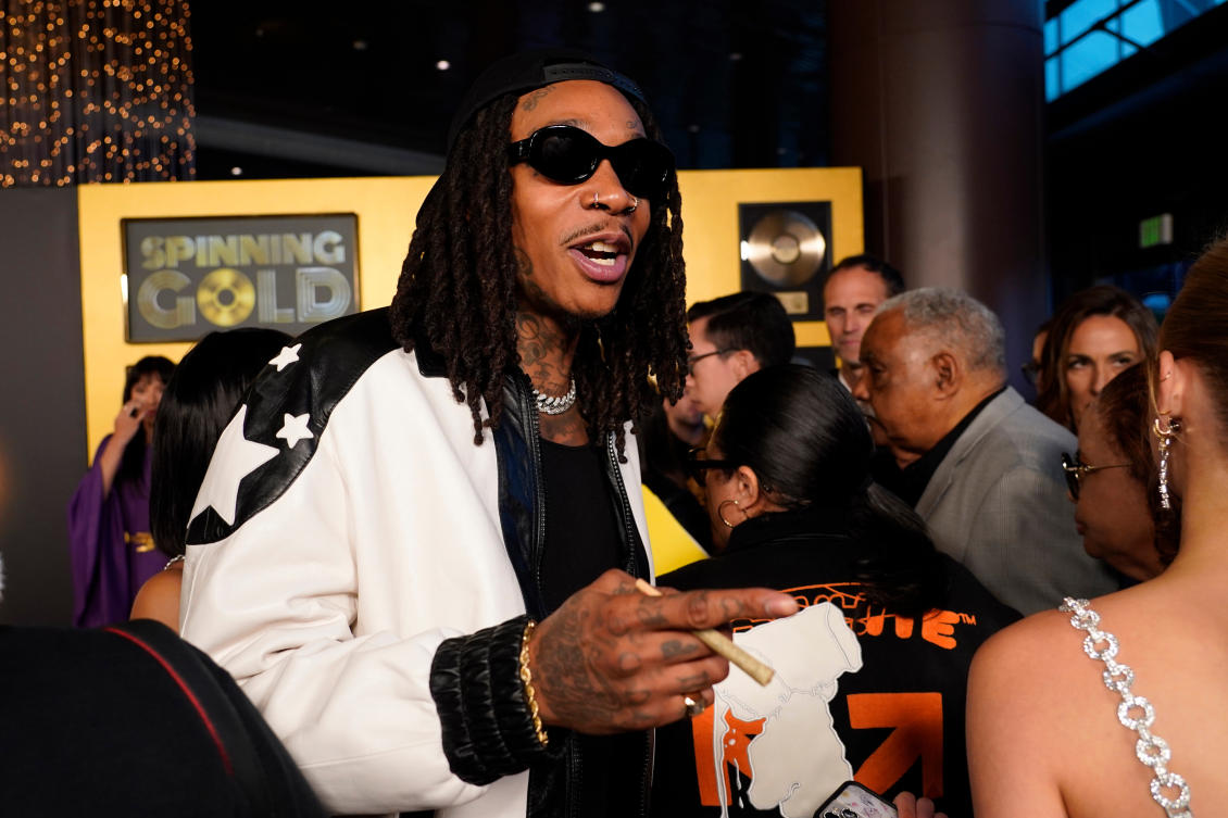 Wiz Khalifa, a cast member in "Spinning Gold," arrives at the premiere of the film, Wednesday, March 29, 2023, at the Directors Guild of America in Los Angeles. (AP Photo/Chris Pizzello, File)