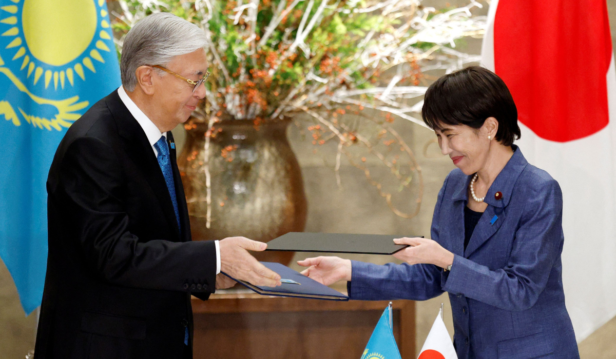 apanese Prime Minister Sanae Takaichi (R) and Kazakhstan's President Kassym-Jomart Tokayev exchange partnership joint statements at the prime minister’s official residence in Tokyo on December 18, 2025. (AFP)