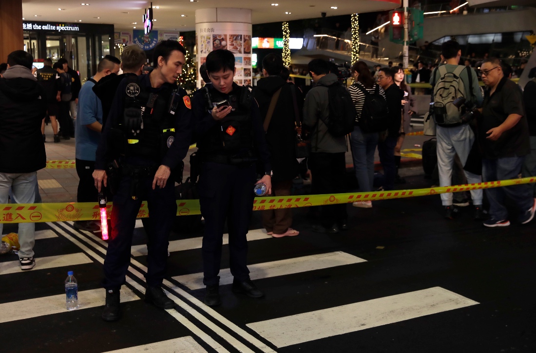 Taiwan police cordoned off the scene after a knife attack in Taipei, Taiwan. (AP)