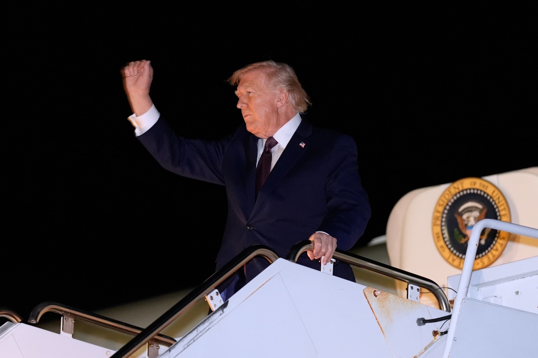 President Donald Trump waves as he arrives on Air Force One at Rocky Mount-Wilson Regional Airport, US. (AP)