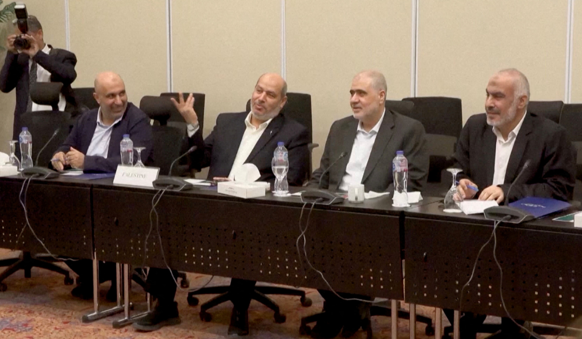 Senior Hamas official Khalil Al-Hayya gestures as he attends a meeting with Egyptian, Qatari and Turkish delegations ahead of a Gaza ceasefire deal announcement, in Sharm El-Sheikh, Egypt, October 8, 2025, in this still image obtained from a video. (REUTERS)