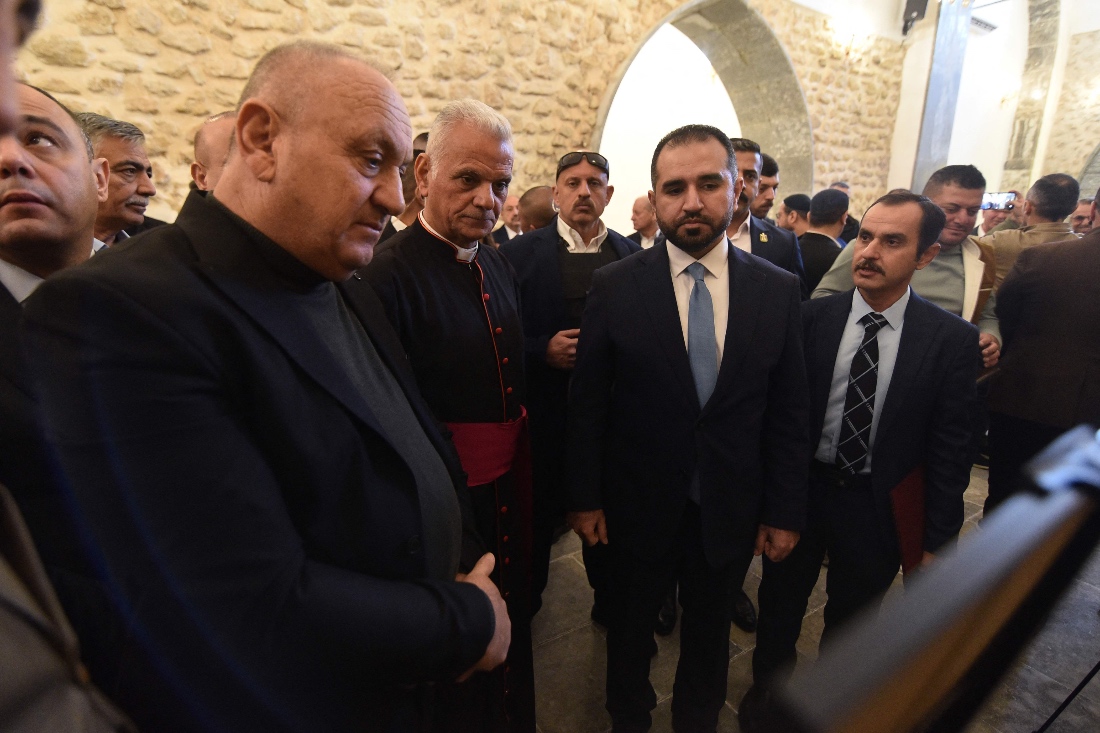 Dr. Rami Joseph, Iraqi Minister of Endowments for Christian, Yazidi, and Mandaean religions, attends th re-opening ceremony of the Mar Oraha Chaldean Monastery following it's destruction by Daesh, in the Tal Keif district, Iraq. (AFP)