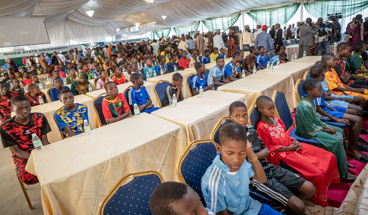 Freed school children are seen during a reception at the Governor's office in Minna on December 8, 2025. (AFP)