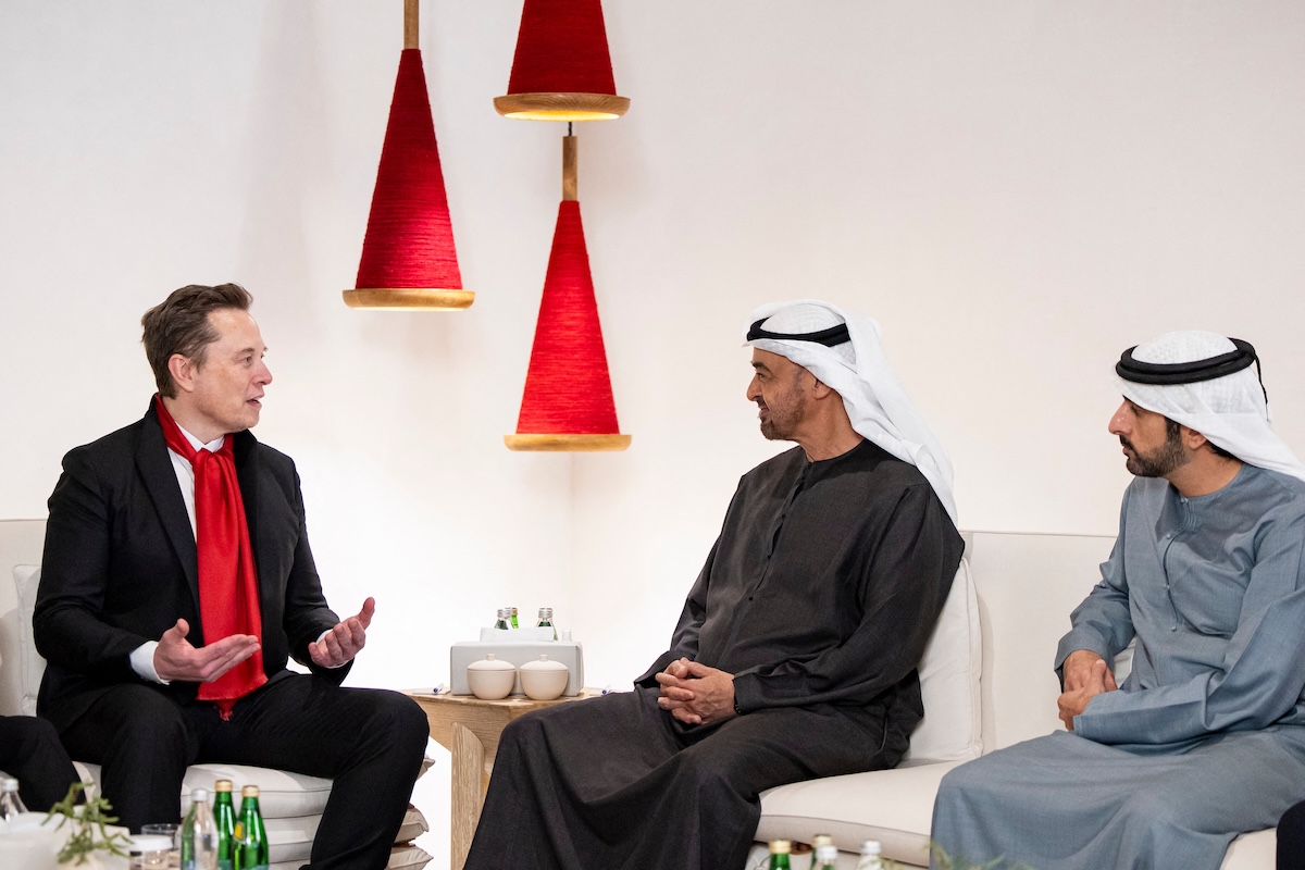 This handout picture provided by the UAE Presidential Court shows UAE President Sheikh Mohamed bin Zayed al-Nahyan (C) and Crown Prince of Dubai Sheikh Hamdan bin Mohammed bin Rashid Al-Maktoum (R) during a meeting with CEO of SpaceX and Tesla Elon Musk (L) at Zayed National Museum in Abu Dhabi on December 20, 2025. (FILE/AFP)