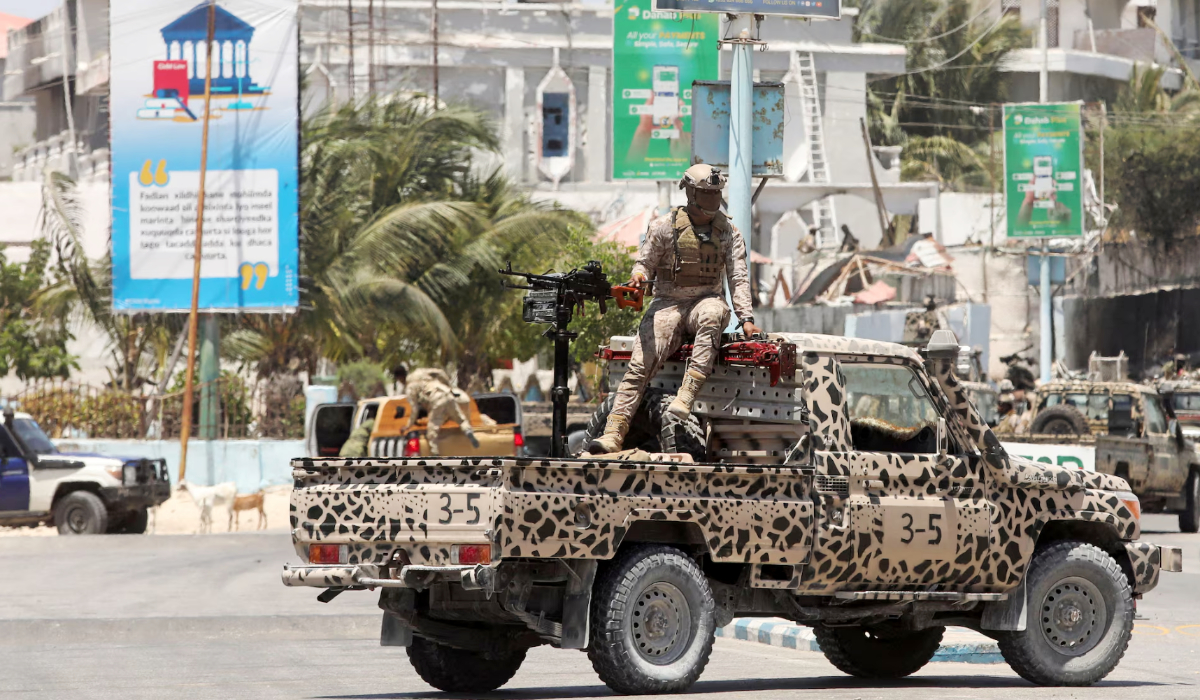 Somali security personnel in Mogadishu. The country is struggling to emerge from decades of conflict and chaos, battling a bloody insurgency and frequent natural disasters. (Reuters)