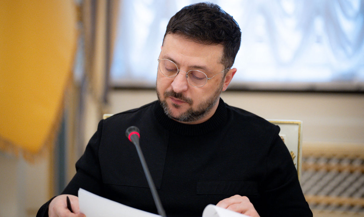 This handout photograph taken on December 23, 2025 and released by the Ukrainian Presidential Office on December 24, 2025 shows Ukraine's President Volodymyr Zelensky during a meeting with journalists in Kyiv. (AFP)