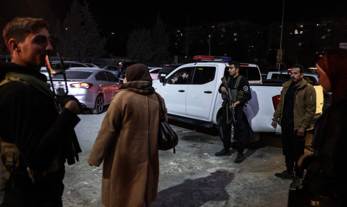 Security forces stand guard in the capital Damascus ahead of Christmas festivities on December 22, 2025. (AFP)