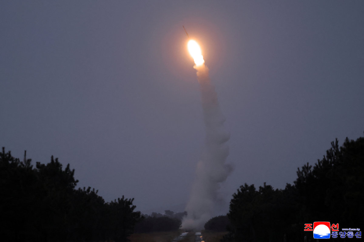 A long-range surface-to-air missile is test-fired near the East Sea, December 24, 2025 in this picture released by North Korea's official Korean Central News Agency on December 25, 2025. (KCNA via REUTERS)