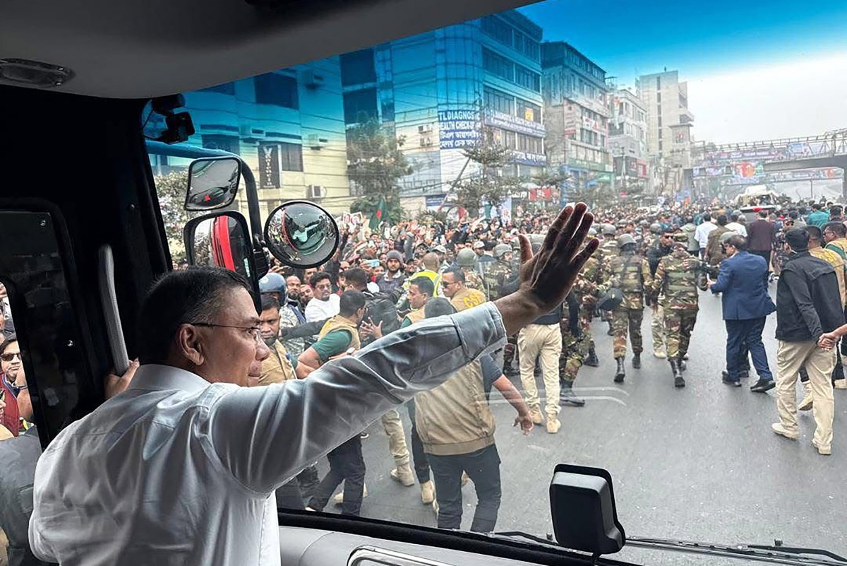 Tarique Rahman, acting chairman of the Bangladesh Nationalist Party, waves to supporters upon his arrival in Dhaka on Dec. 25, 2025. (BNP)