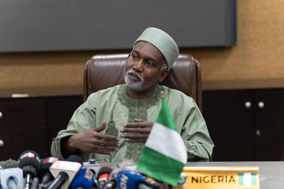Nigeria's Minister of Foreign Affairs Ambassador Yusuf Tuggar speaks during a joint press briefing with Benin's Foreign Minister Olushegun Adjadi Bakari (unseen) at the Economic Community of West African States Commission (ECOWAS) commission in Abuja, on December 12, 2025. (Photo by Light Oriye Tamunotonye / AFP)