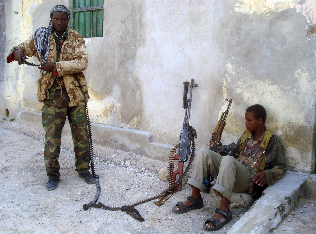 A photo dated 2010 shows an Al-Qaeda linked Shabab militant straps ammunition around his waist in Mogadishu, Somalia. (AFP)