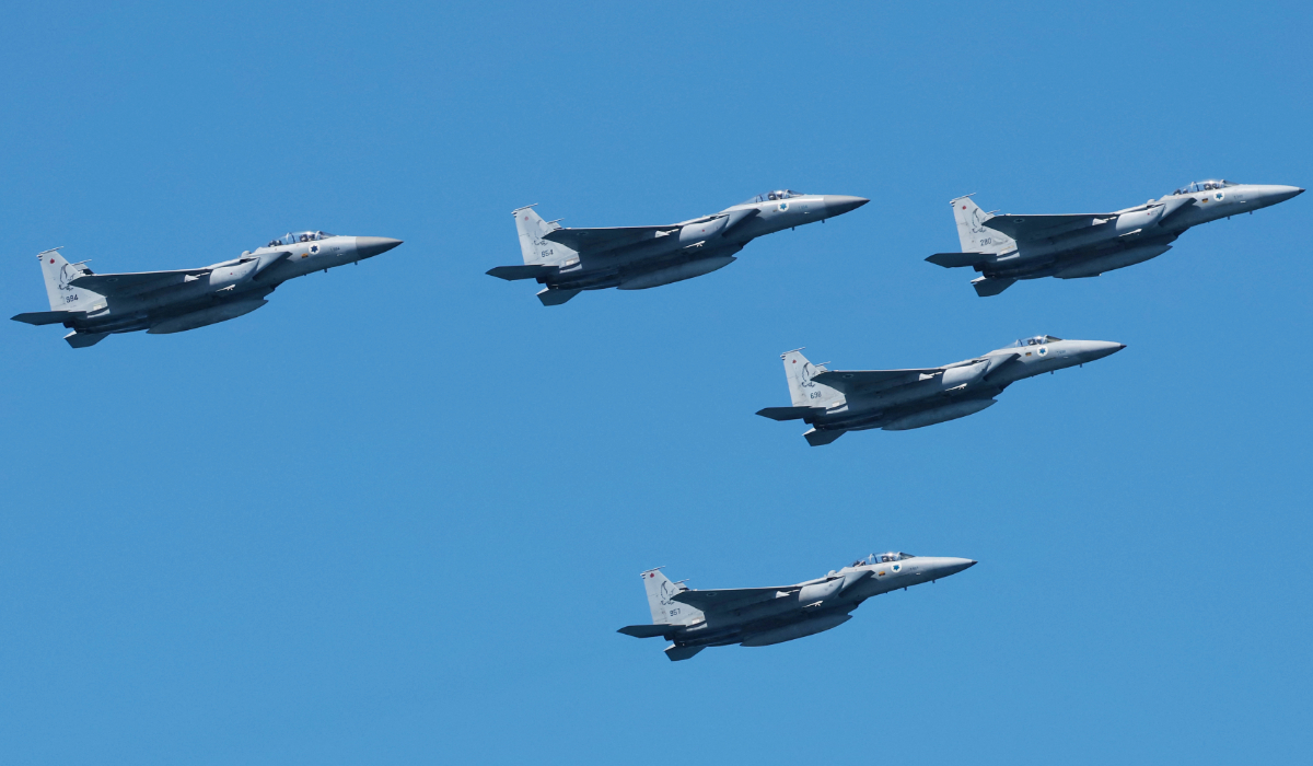Israeli Air Force F-15 Eagle fighter jets flyover a beach during an airshow in Tel Aviv on April 26, 2023, to mark the 75th anniversary of the State of Israel's creation. (AFP)