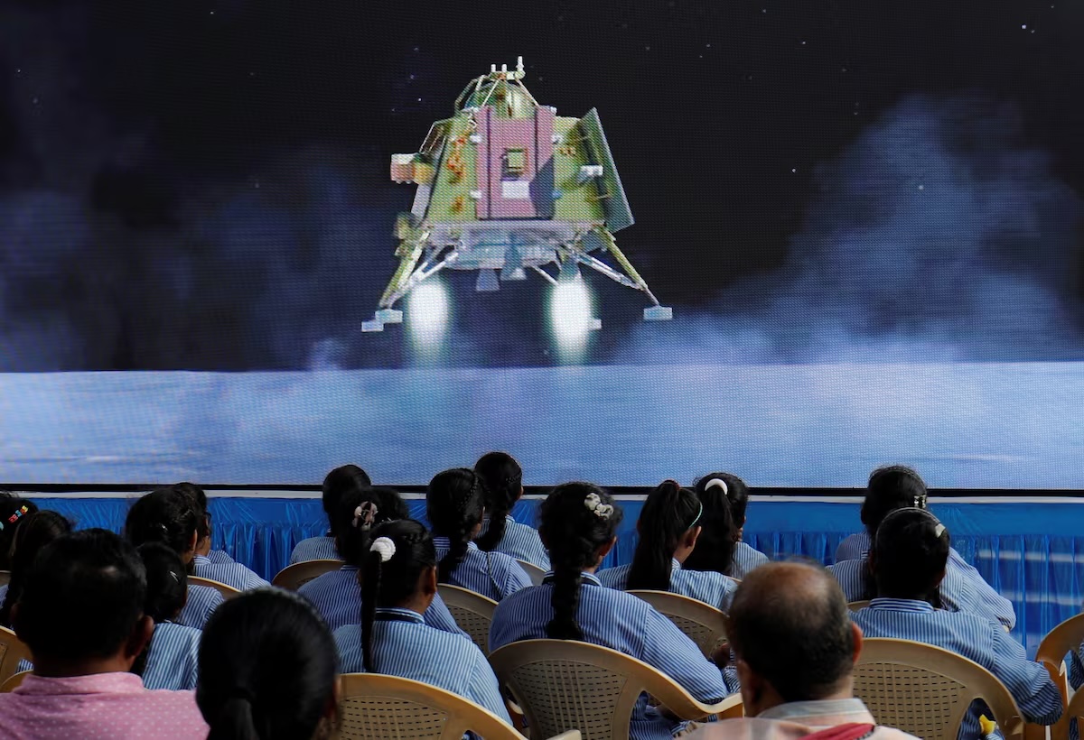 People watch a live stream of Chandrayaan-3 spacecraft's landing on the moon, inside an auditorium of Gujarat Science City in Ahmedabad, India, Aug. 23, 2023. (Reuters/File)
