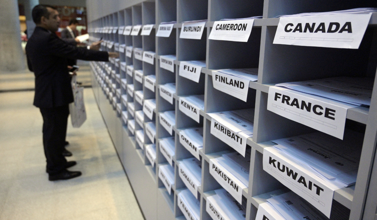 People take documentation at the hall of the Second High-level UN Conference on South-South Cooperation in Buenos Aires. (AFP)