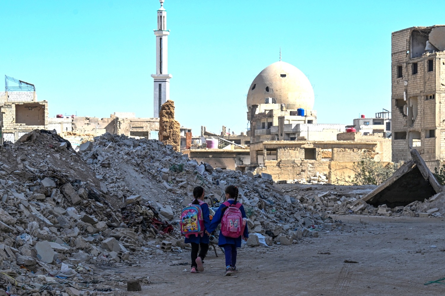 It is possible to build a Syria where every child survives, learns and thrives in peace and dignity (AFP)
