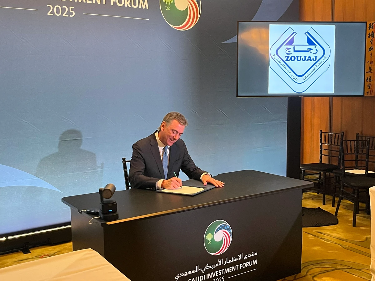Ron Vaupel, president and CEO of Guardian Industries, signs a memorandum of understanding during the U.S.-Saudi Business Forum in Washington.