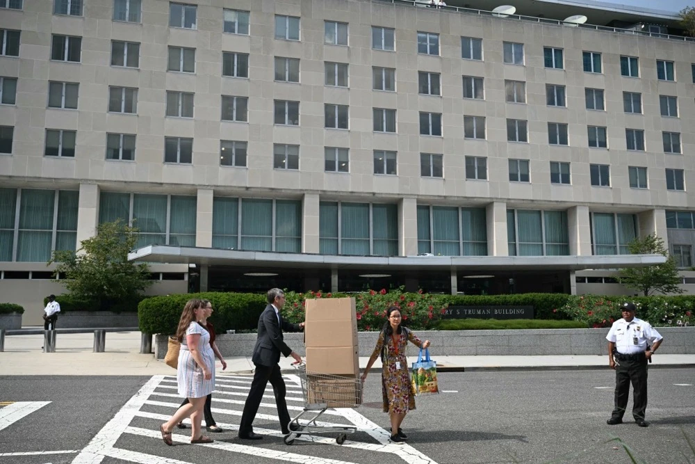 Hundreds of those workers were terminated in September, before the shutdown. (AFP/File)