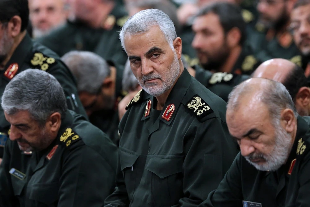 The late Iranian General Qassem Soleimani confronted Syria’s National Security Bureau chief Ali Mamlouk in late 2019 after seeing Luna Al-Shibl leaving his office. (AFP file photo)