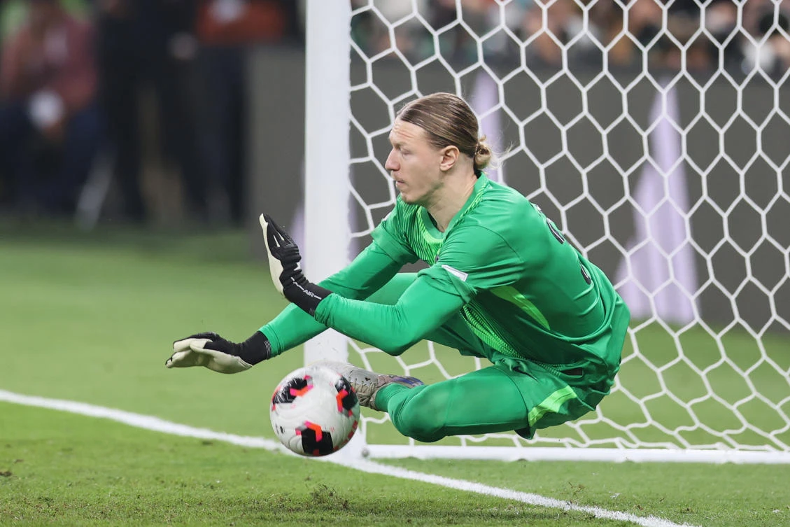 PSG’s goalkeeper Matvey Safonov stop a ball in the penalty shootout during their FIFA Intercontinental Cup final match against Flamengo in Doha, Dec. 17, 2025. (AP)